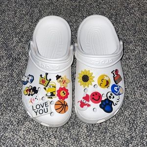 CROCS with assorted gibits